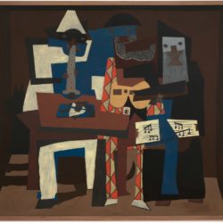 1956: Pablo Picasso (1881- 1973), "Three Musicians Fontainebleau", summer 1921. Oil on Canvas, 6’7” x 7’3 ¾”. Mrs. Simon Guggenheim Fund. The Museum of Modern Art, New York, N.Y., U.S.A. Digital image © The Museum of Modern Art/Licensed by SCALA / Art Resource, N.Y. © 2018 Estate of Pablo Picasso/ Artists Rights Society (ARS), New York